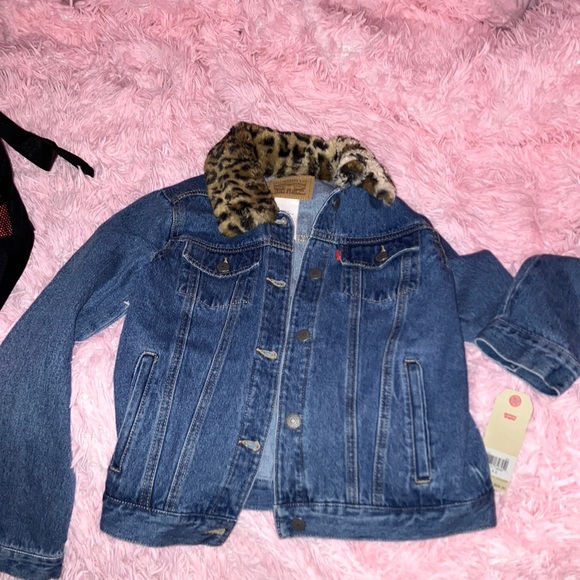 it’s a levi’s jacket , it’s a larger but fits more like a medium.